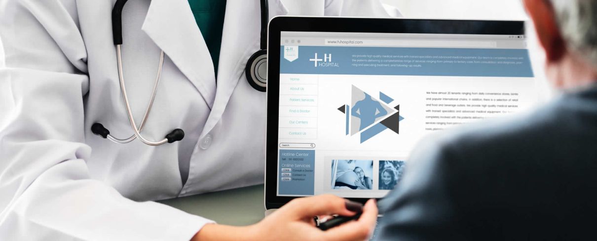 doctor discussing private medical services with patient